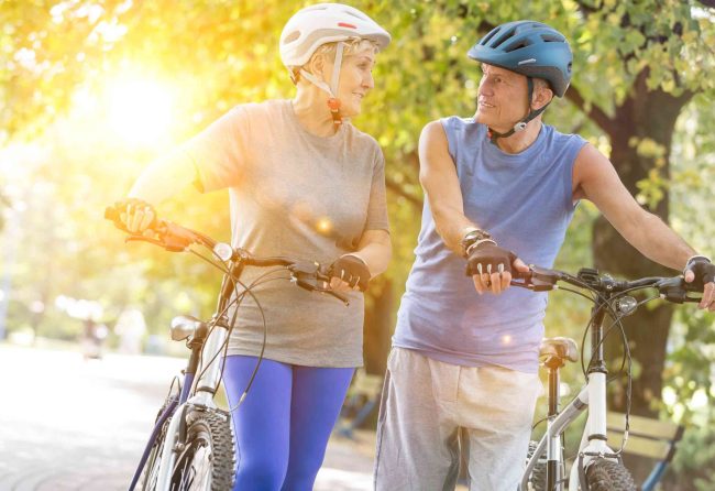 Seniors taking a break from a morning bicycle ride around their retirement village.